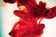 Some food dye dropped in water