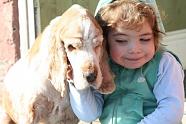 This is my daughter with an old dog we rescued, he loved sharing her crisps.