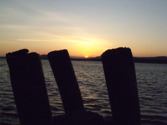 Suset through the mooring poles