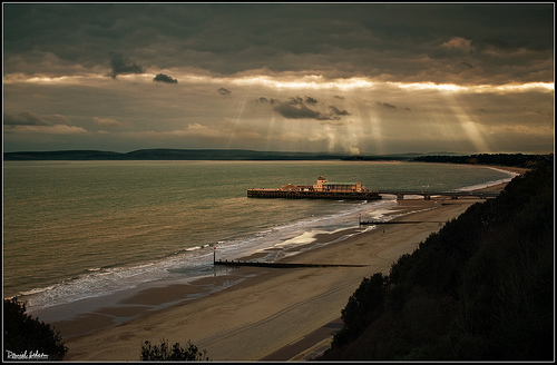 I took this photo on a cliff overlooking the coast and the Pier at Bournemouth.
I feel I was blessed with the view of shafts of lights through the clouds.

It looks so surreal and calm, it was in fact freezing and windy. but you wouldn't know if I hadn't of said.